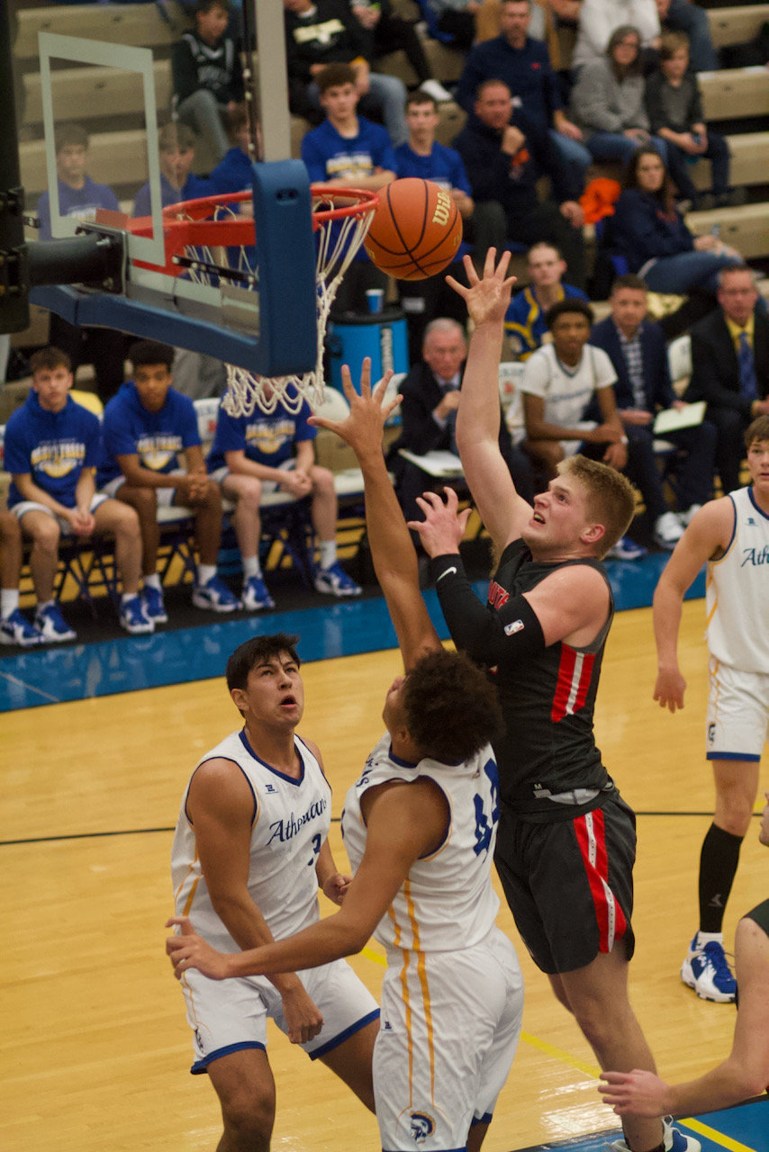 Carson Chadd goes up for shot during the Mounties 41-40 loss.